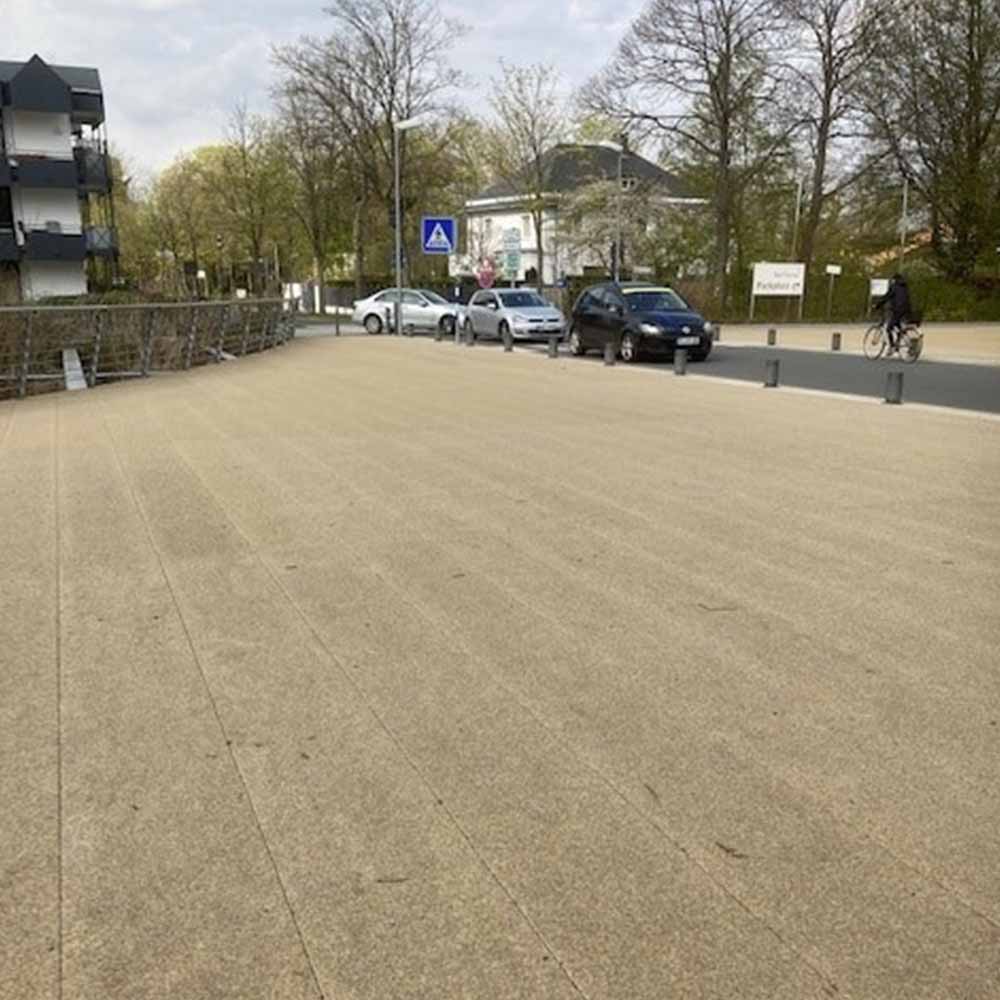 GRP bridge deck renovation with anti-slip and wear layers